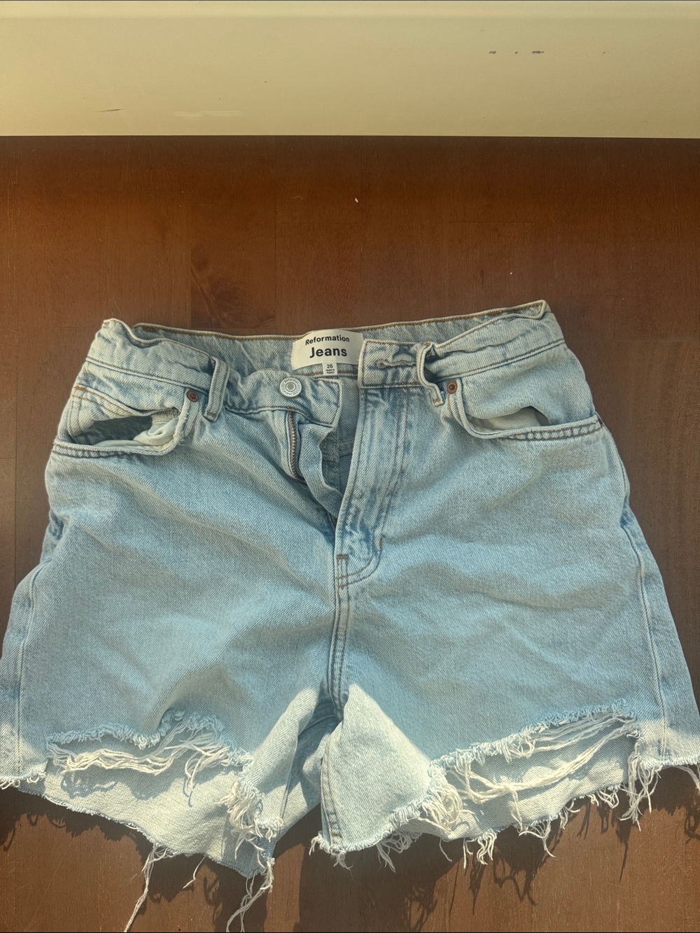 Reformation Light Wash Frayed Hem Denim Shorts